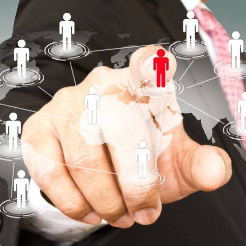 social network concept : hand point to social network and world